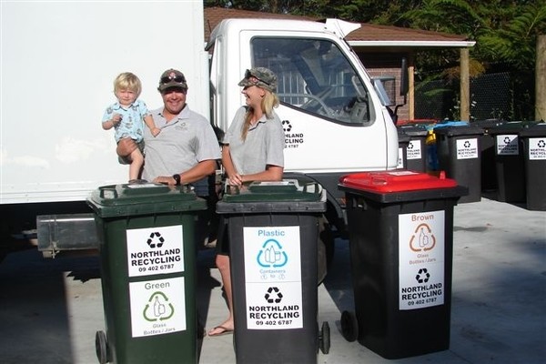 Committed to recycling -Brody Newton, his 'main man' Flynn and co-partner Jeannie Henderson at their Haruru Falls depot.